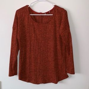 Dark orange long sleeve with a mid zipper on back